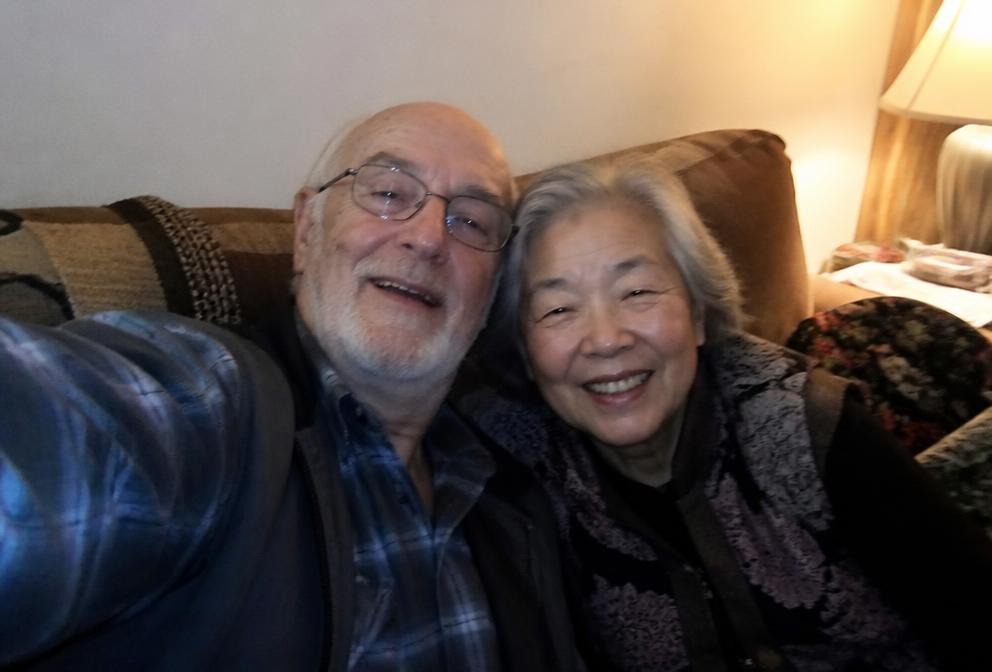 Grandma and Grandpa taking a selfie together at home